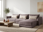 Canapea modulară gri în showroom mobilier calitate superioară